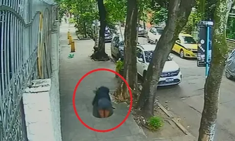 Đang đi bộ, người phụ nữ bất ngờ bị "nuốt chửng" giữa đường
